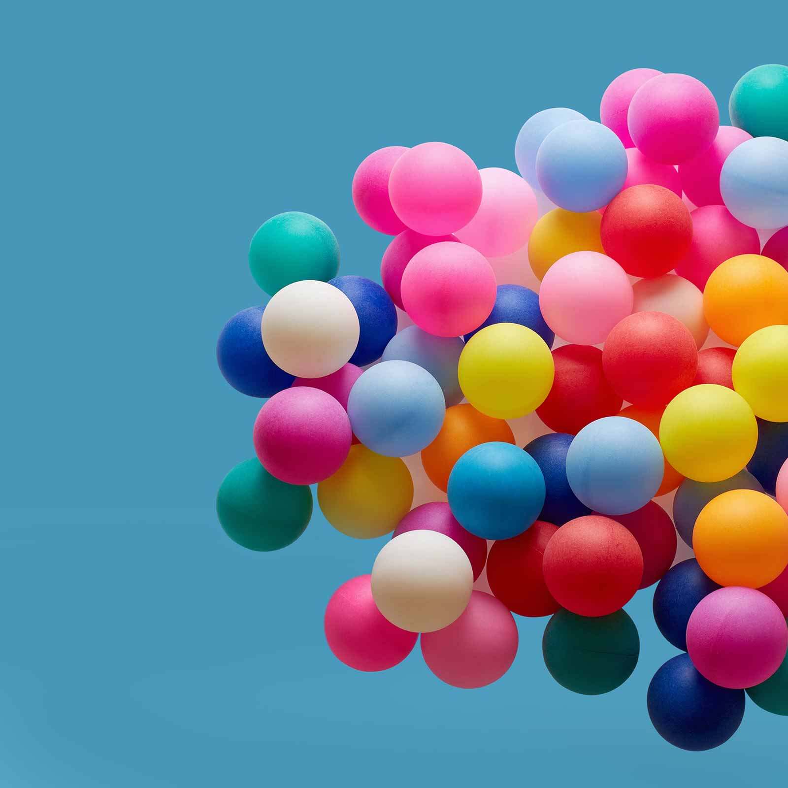 Colourful balloons on a blue backgroud